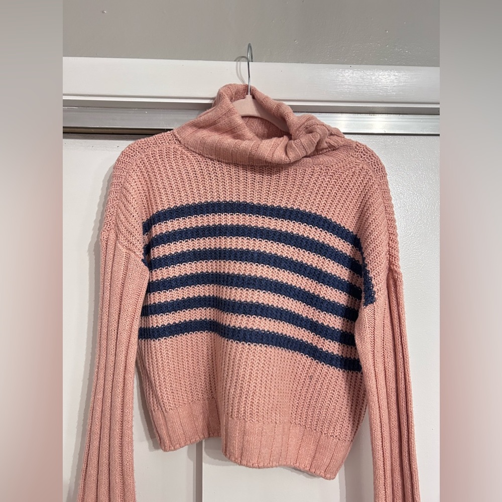 Pink and navy loose turtleneck sweater